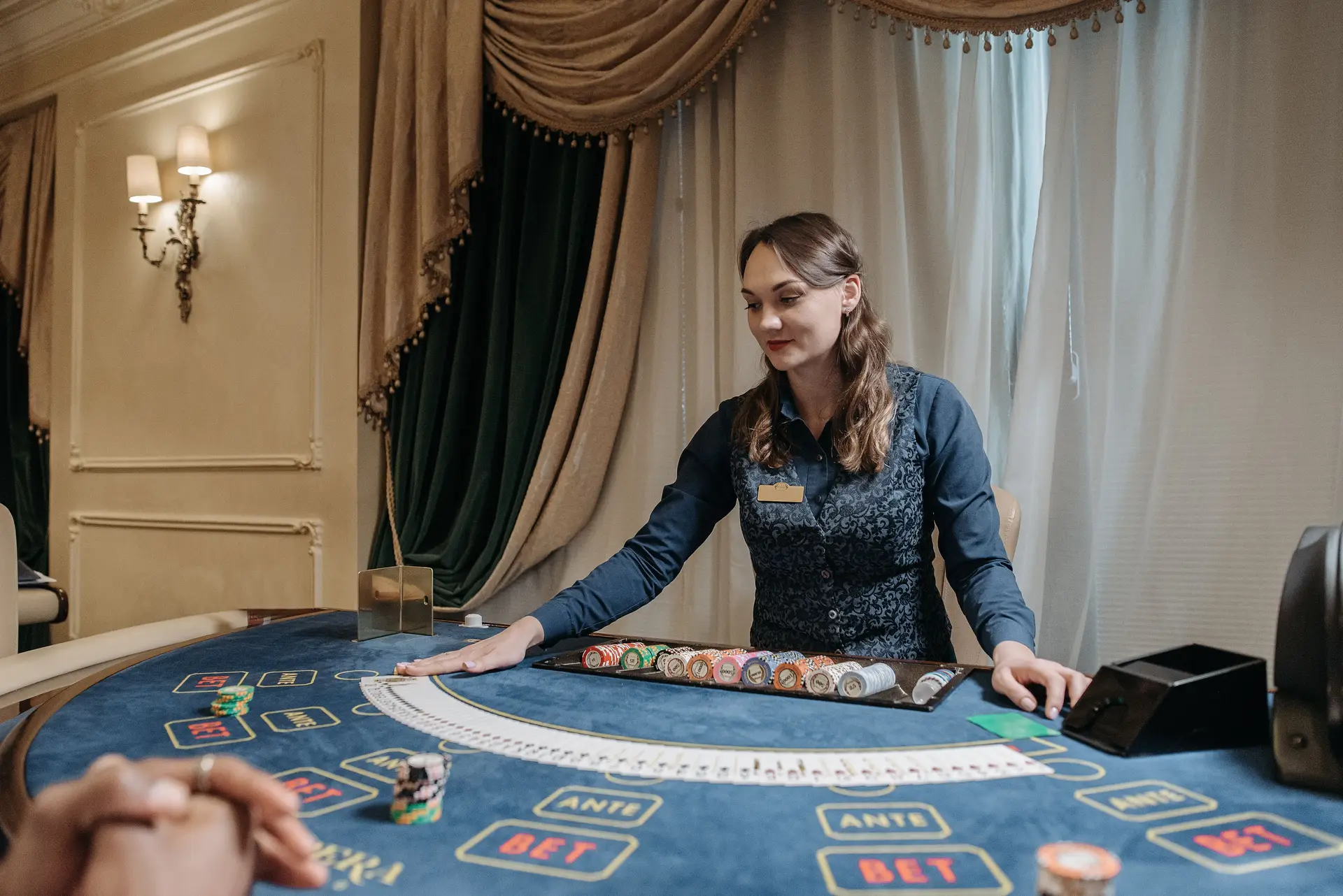 Professional host at a table game