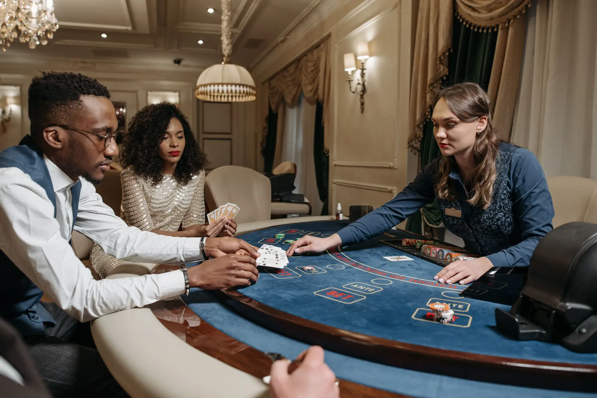 Guests seated around a poker table